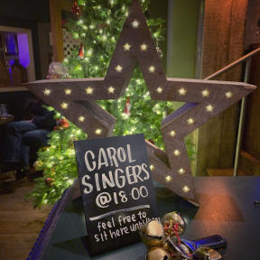 Carol Singing at Home Cottage 